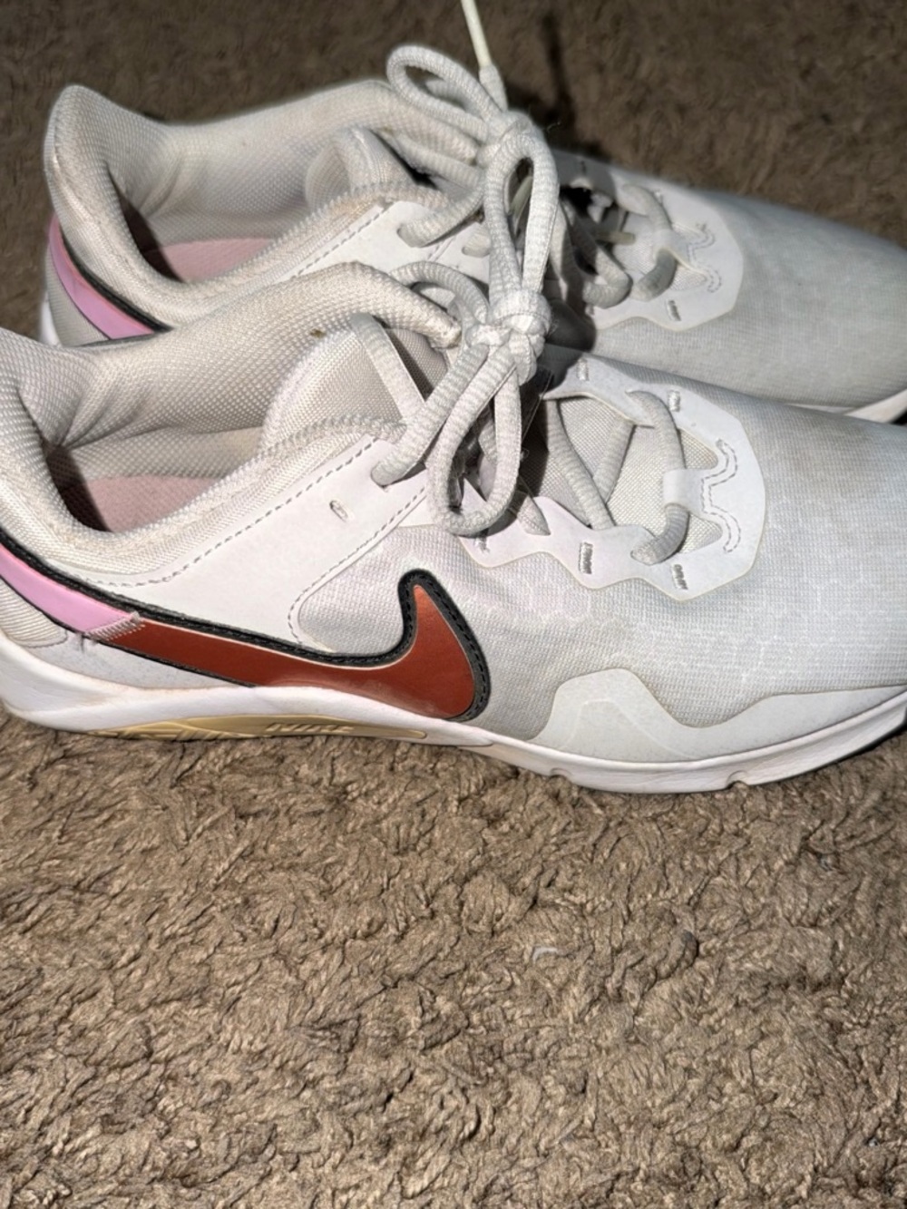 Nike Women's White Athletic Sneakers with Pink Heel and Rust Swoosh